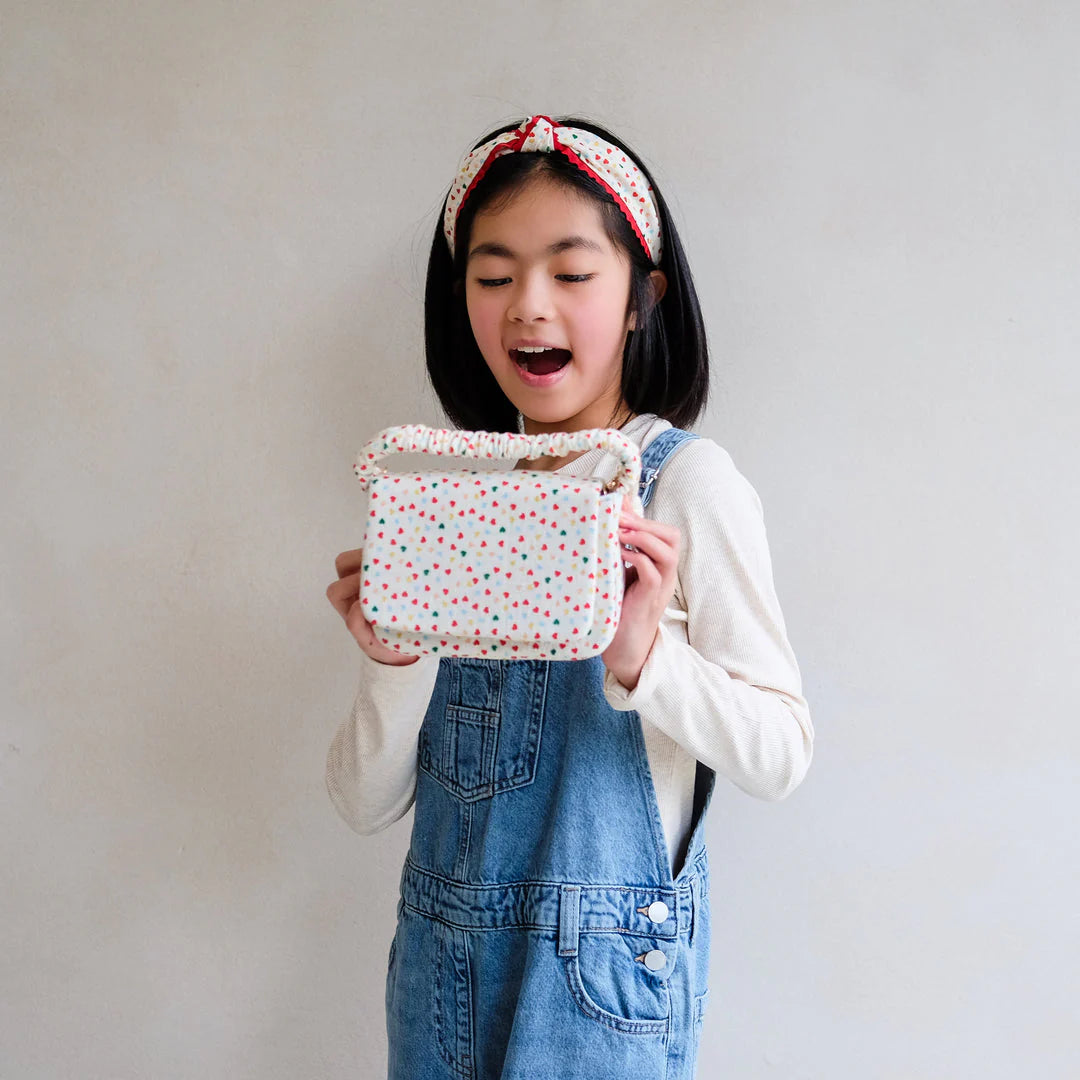 Heart print top handle bag
